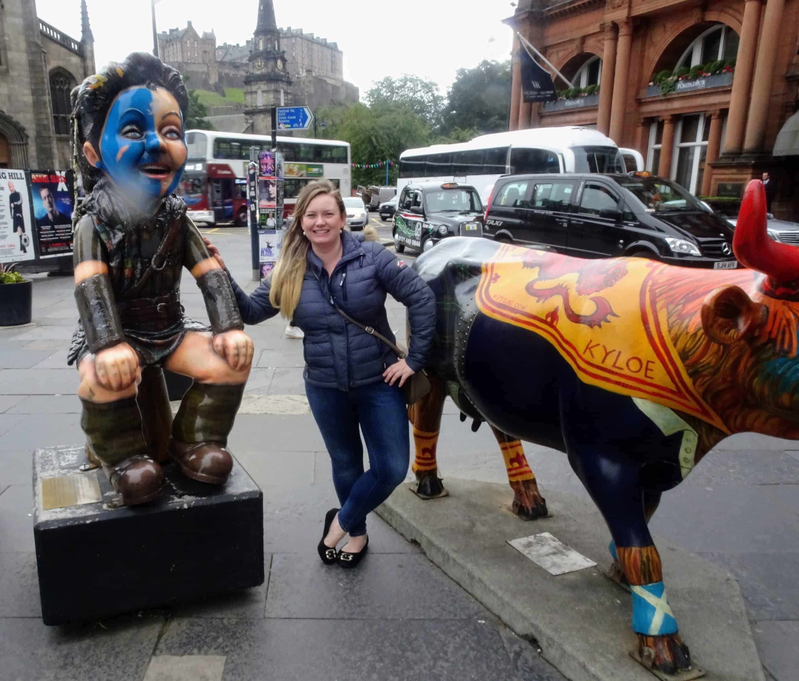 Image of me with a cartoon statue of William Wallace with Edinburgh Castle behind.
