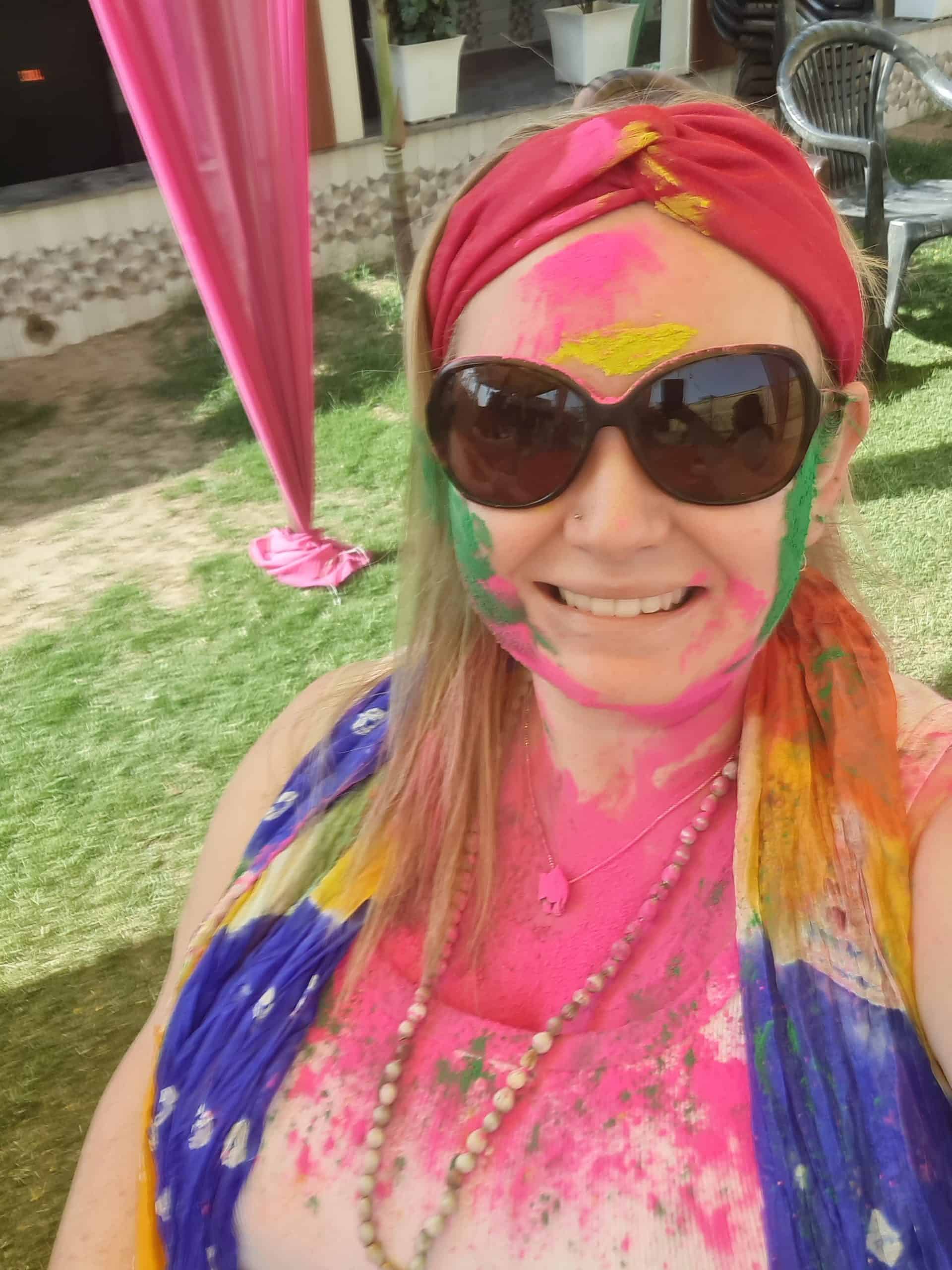 A selfie of the blogger covered in multiple colours 