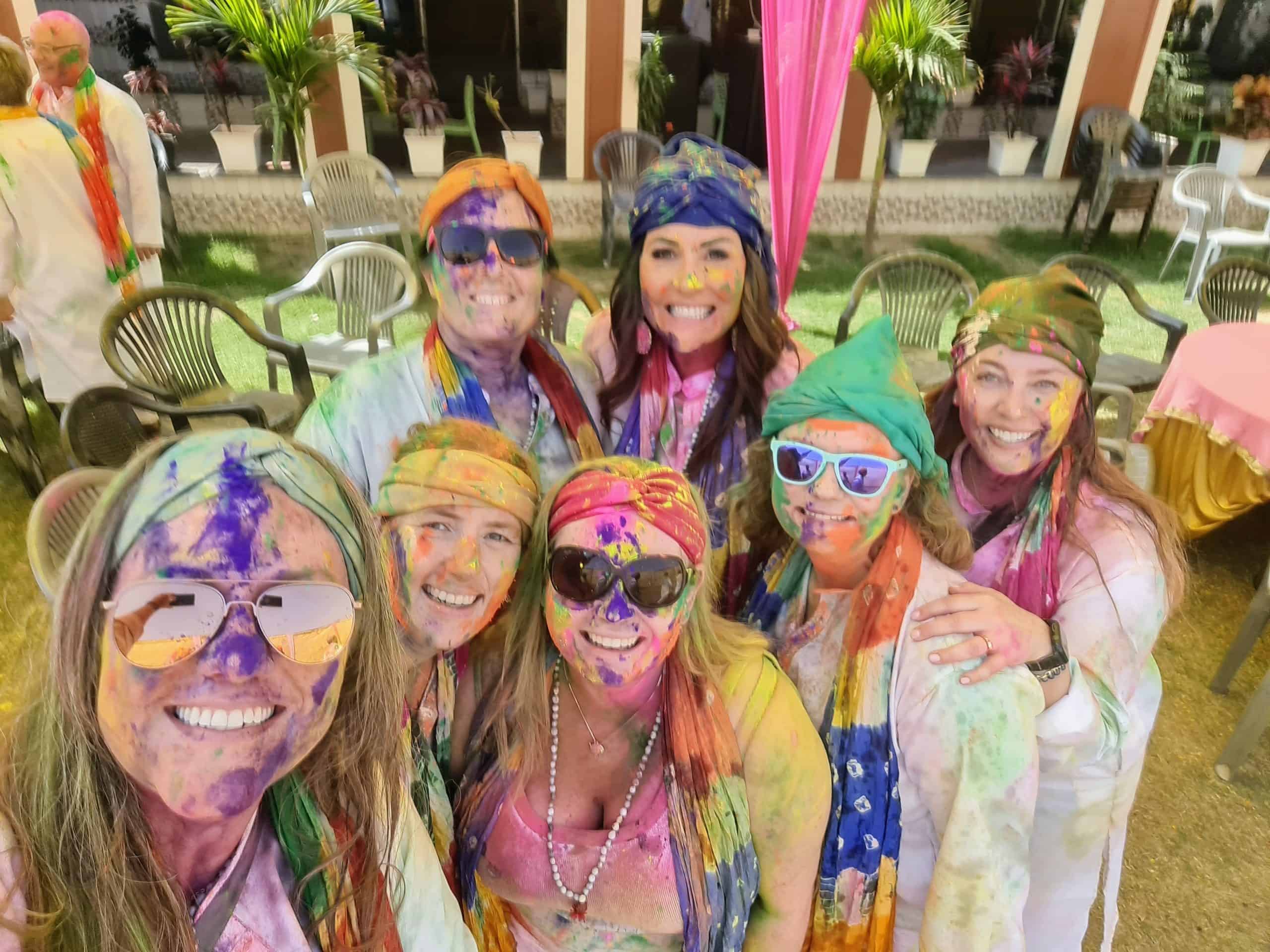 a group of friends of the blogger covered in holi colours