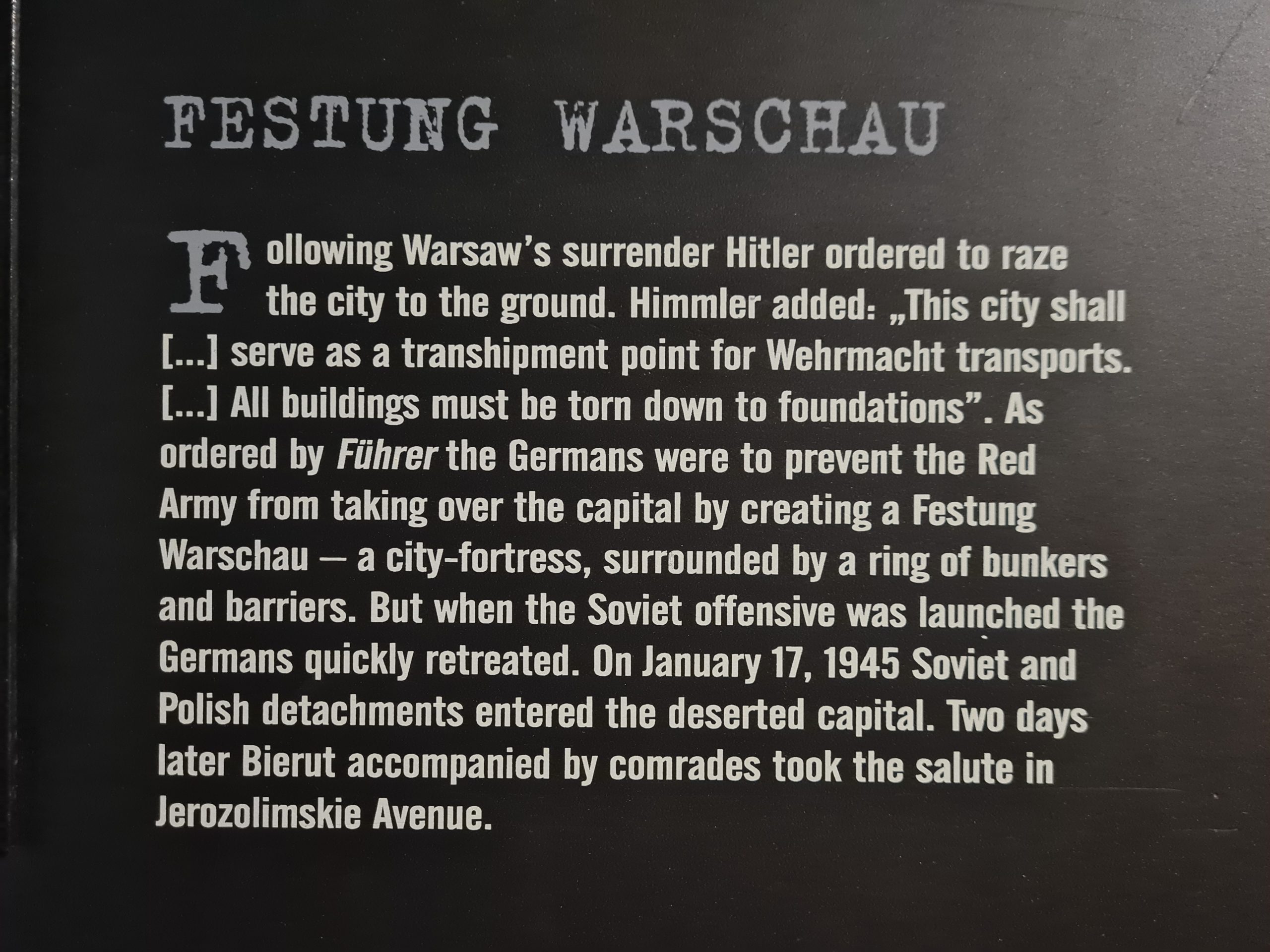 A sign inside the Warsaw uprising museum talking about Hitler's plans of what was to happen to the city of Warsaw after the rising