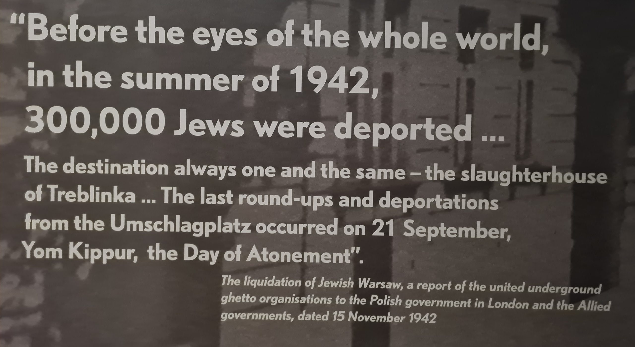 A sign from the warsaw POLIN museum talking about the round up and deportation of Jews from Warsaw during world war II and taking them to Treblinka Concentration camp in summer 1942